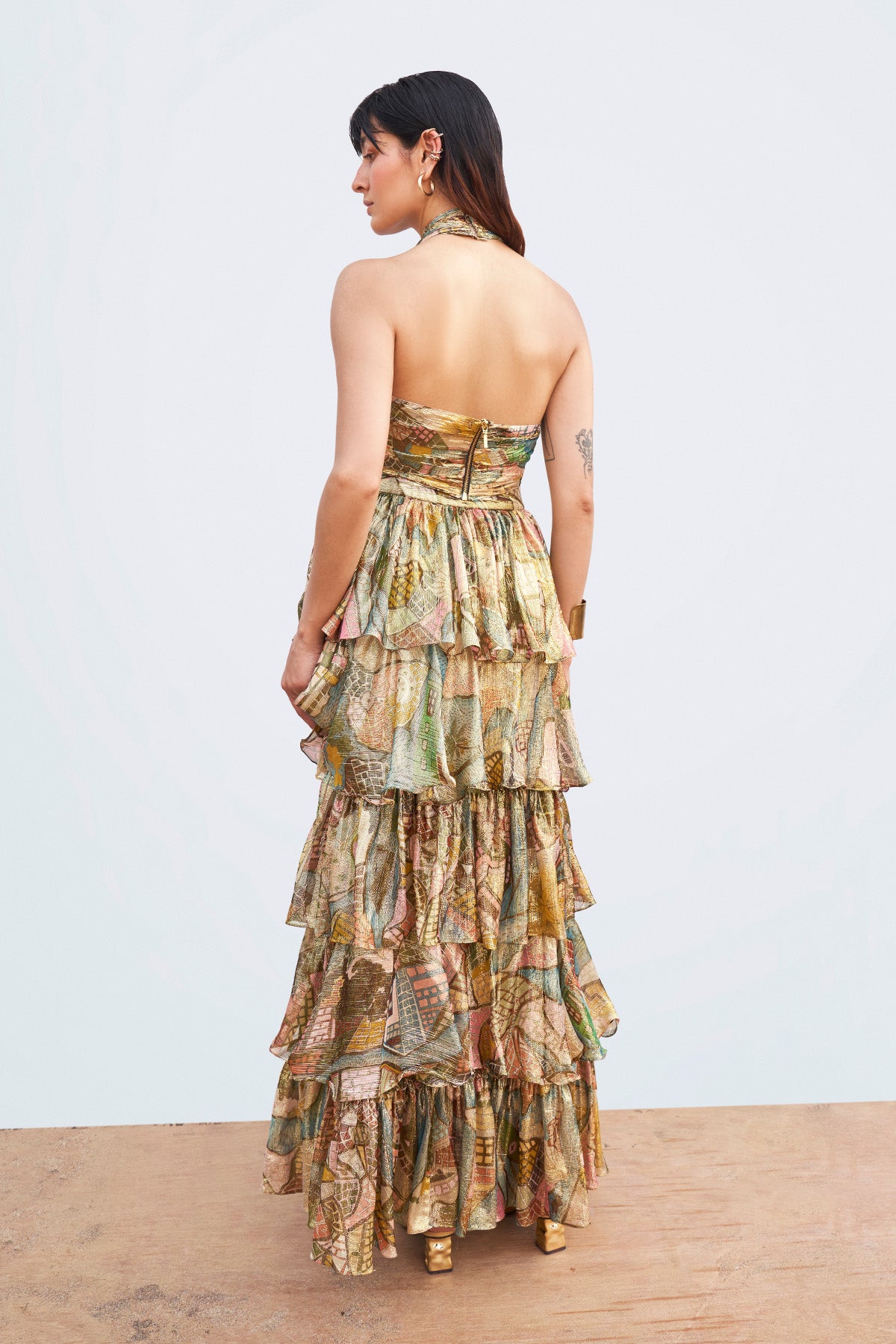 Right side view of Starboard & Port gold top and midi skirt.