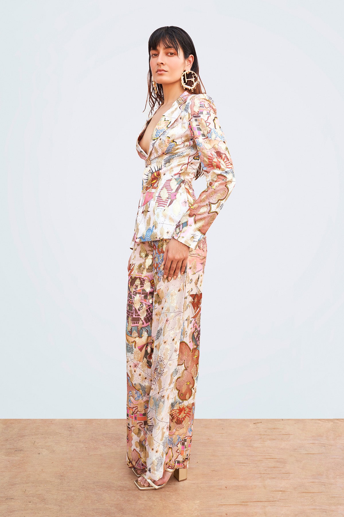 Close-up of fabric print and jacket stitching details.