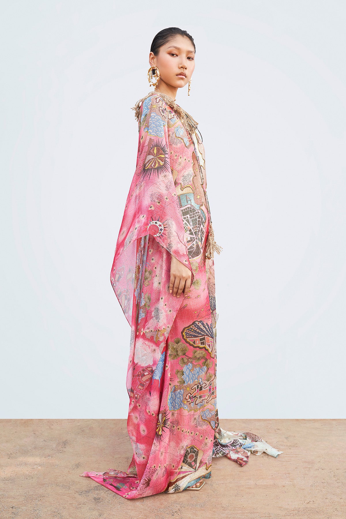 Right side view of multi-color Starboard & Port printed kaftan with embellished neckline trim