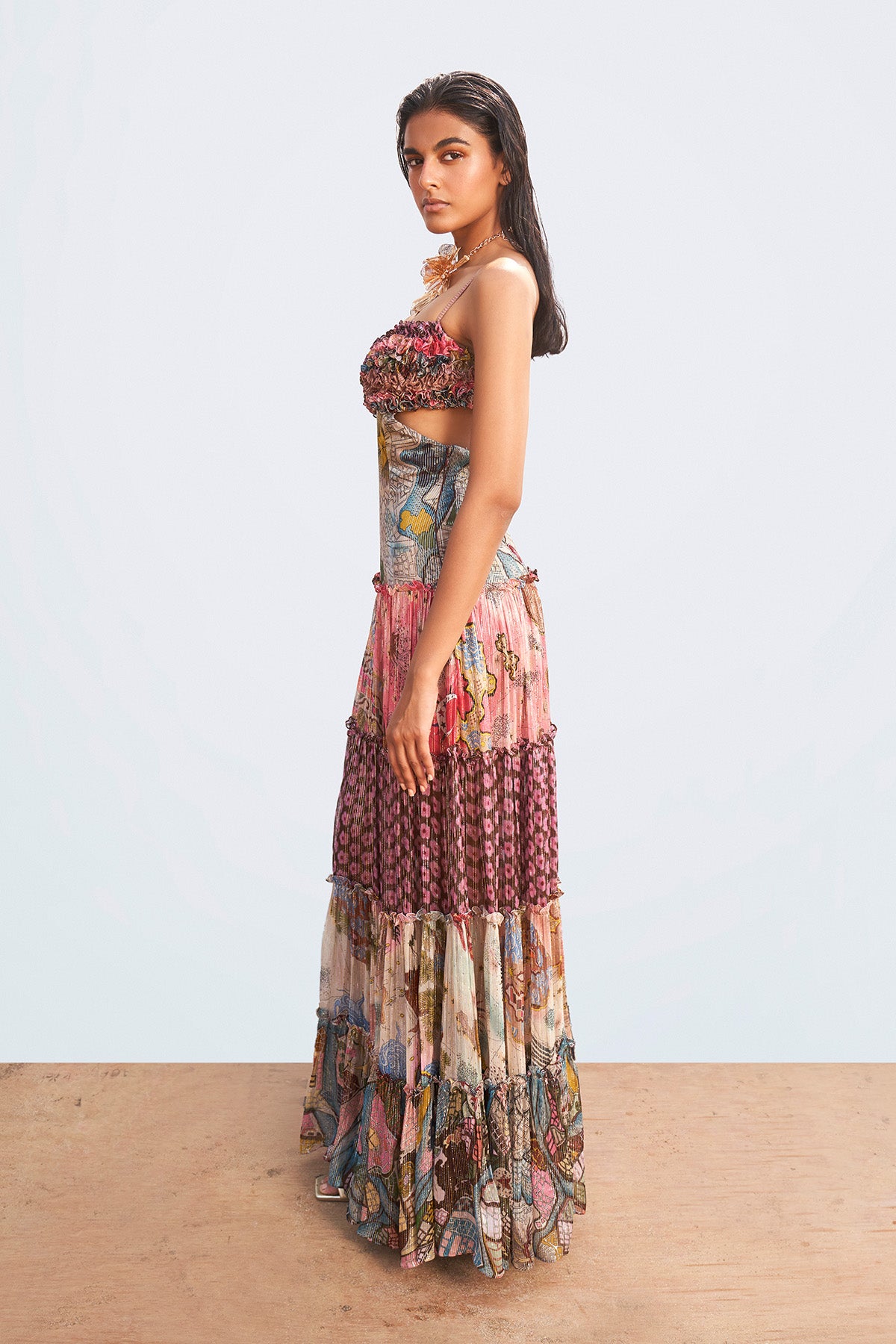 Close-up of ruffle trim and fabric print on left side.

