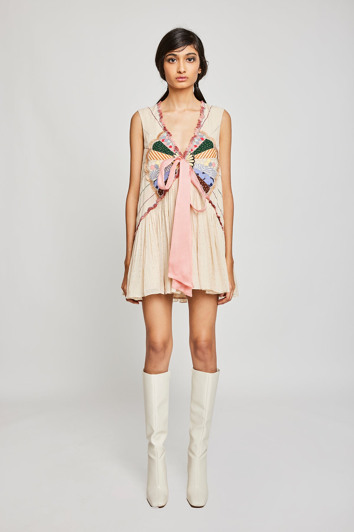 Front view of Trencadís beige dobby appliquéd dress