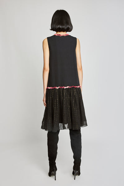 Close-up of left side appliqué and bow-tie details