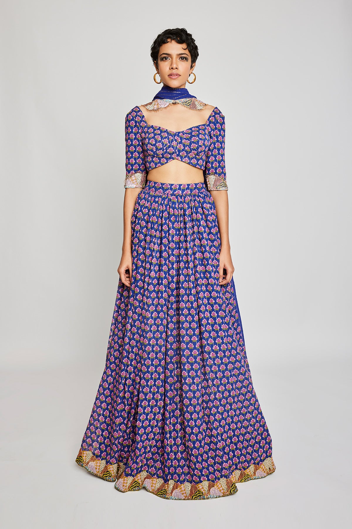 Front view of the Trencadís blue dobby embellished lehenga set