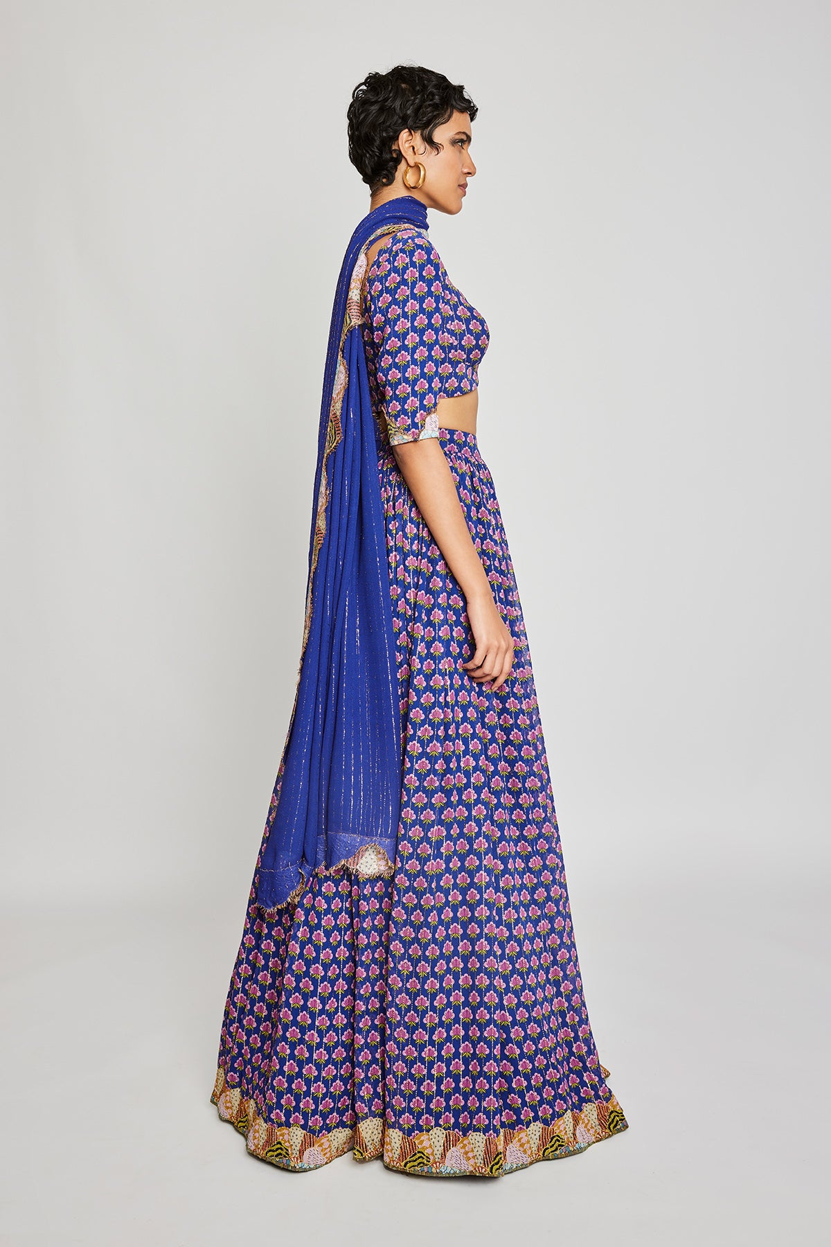 Close-up of the front detailing on the Trencadís blue dobby embellished lehenga set