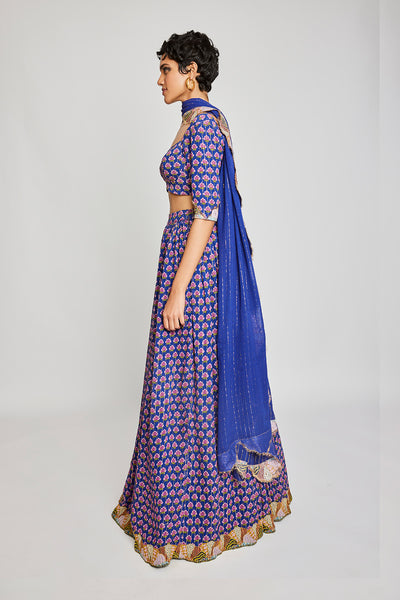 Left side view of the Trencadís blue dobby embellished lehenga set