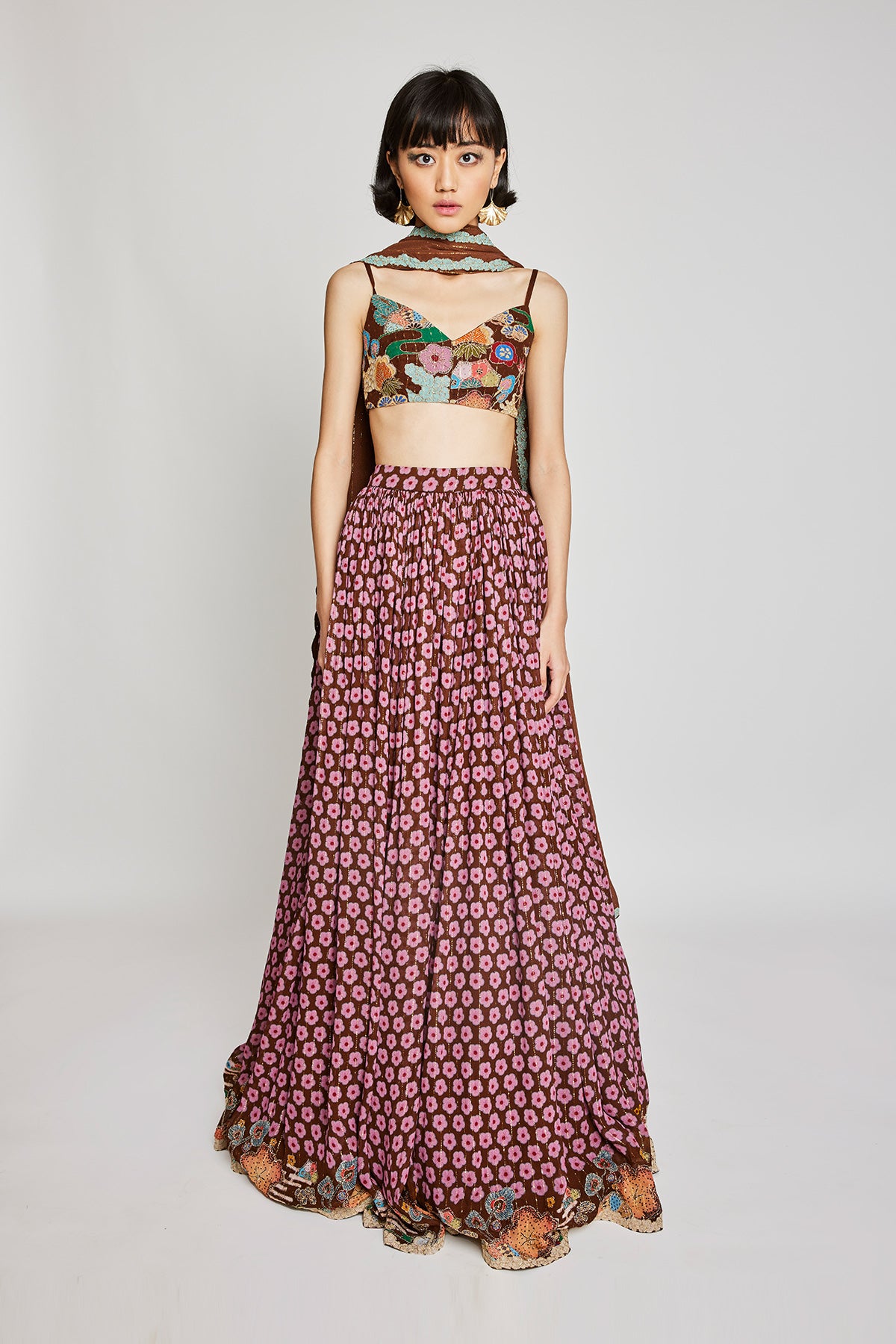 Front view of the Trencadís brown dobby floral embellished lehenga set