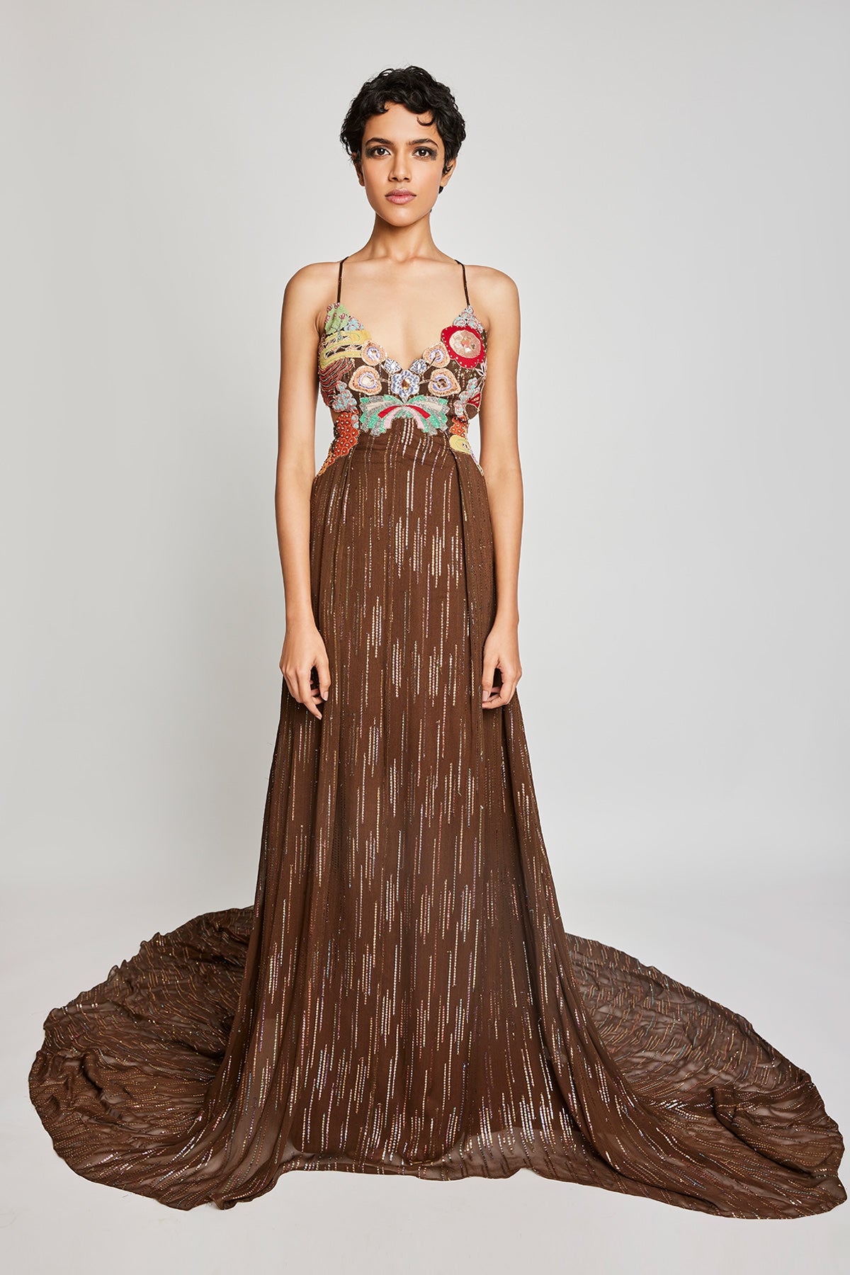 Front view of the Trencadís brown dobby appliquéd and embellished trail gown