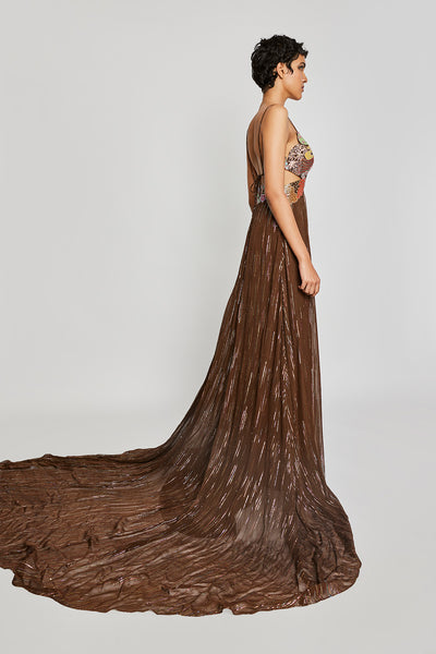 Close-up of the front appliqué and embellishments on the Trencadís brown dobby trail gown