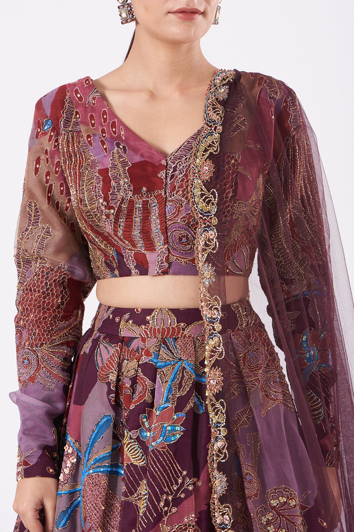 Close-up of Aisha Rao plum embellished organza top