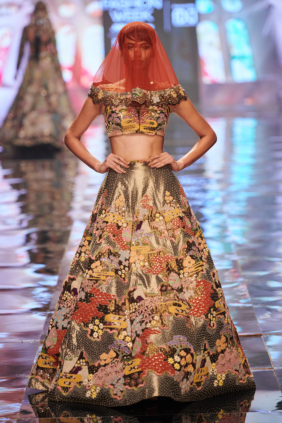 Front view of Gold Trencadís appliquéd and embellished lehenga set.