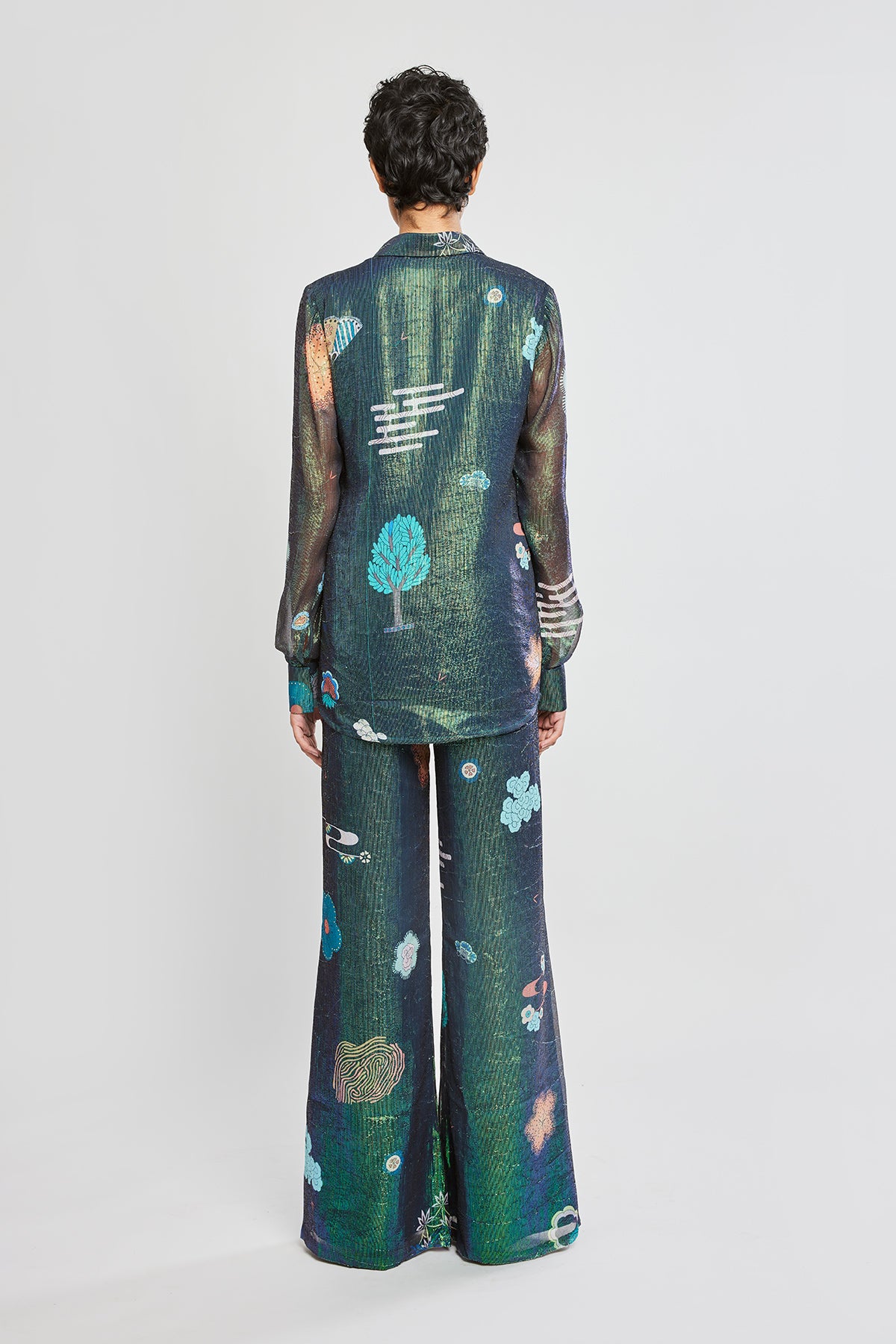 Close-up of left side shirt and pants details