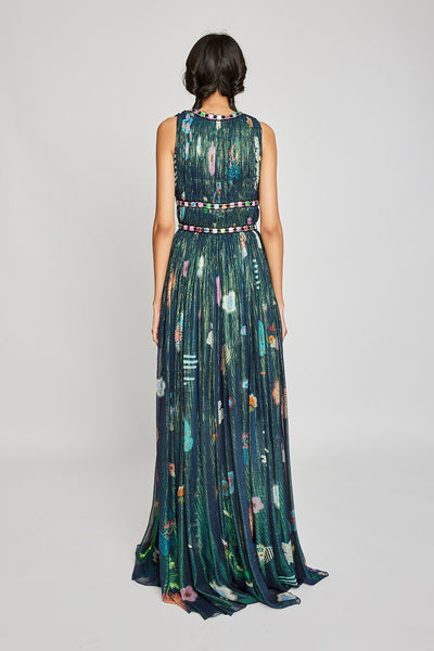 Close-up of the left side ruched details on the Trencadís green gown