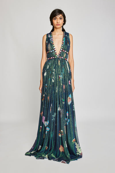 Front view of the Trencadís green gown with ruched detailing