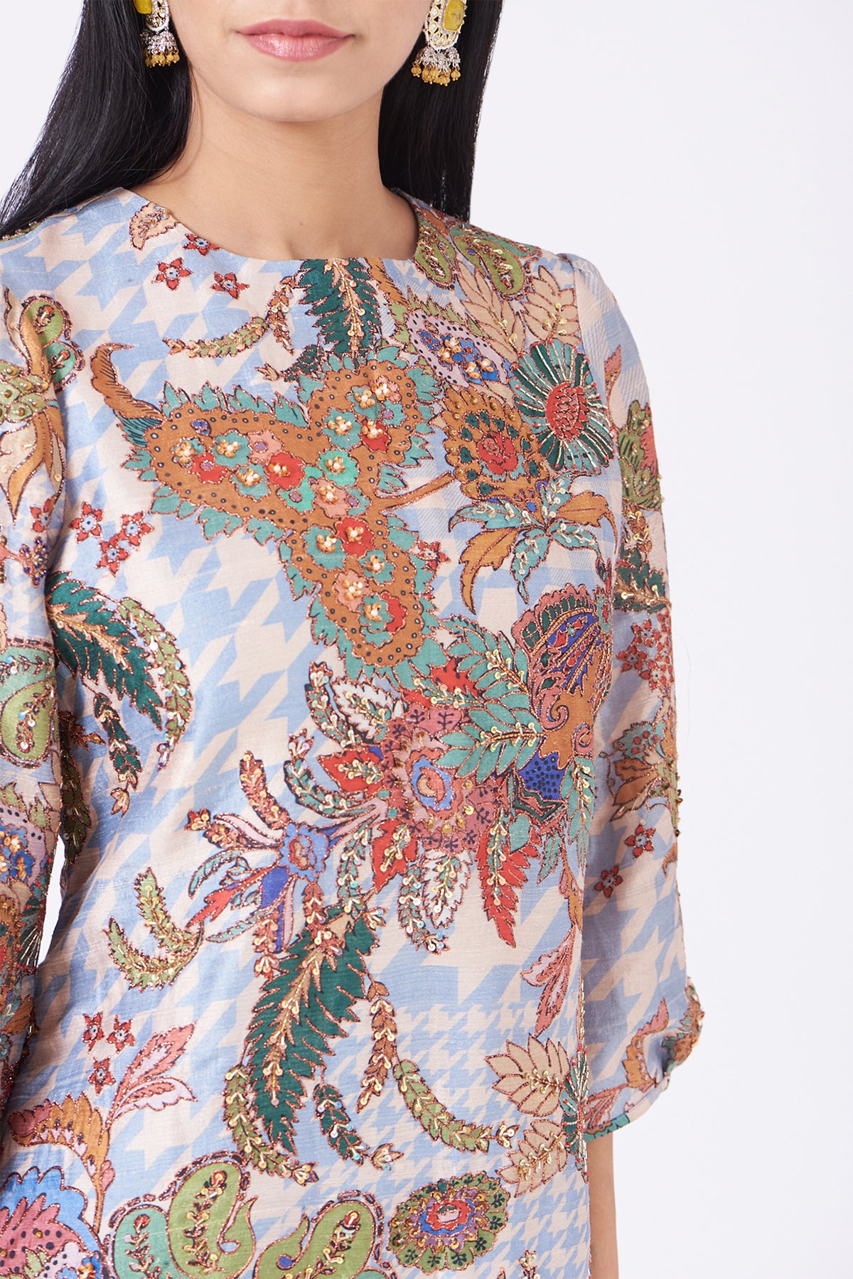 Close-up of right side print and embellishments