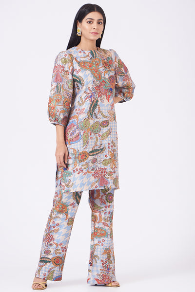 Right side view of light blue juna printed and embellished raw silk kurta and pant