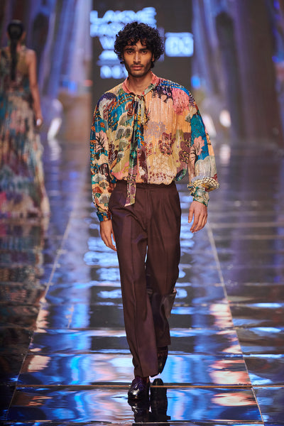 Front view of Trencadís blue embellished sleeveless gown.