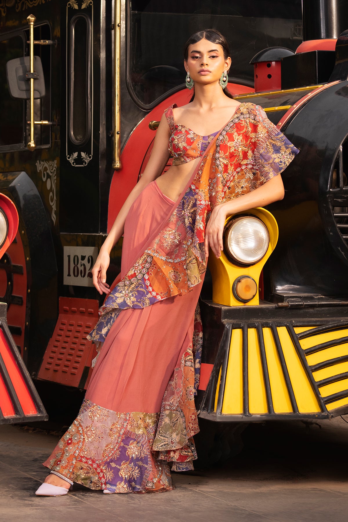 Front view of ‘Esha’ ruffled peach organza saree with matching blouse