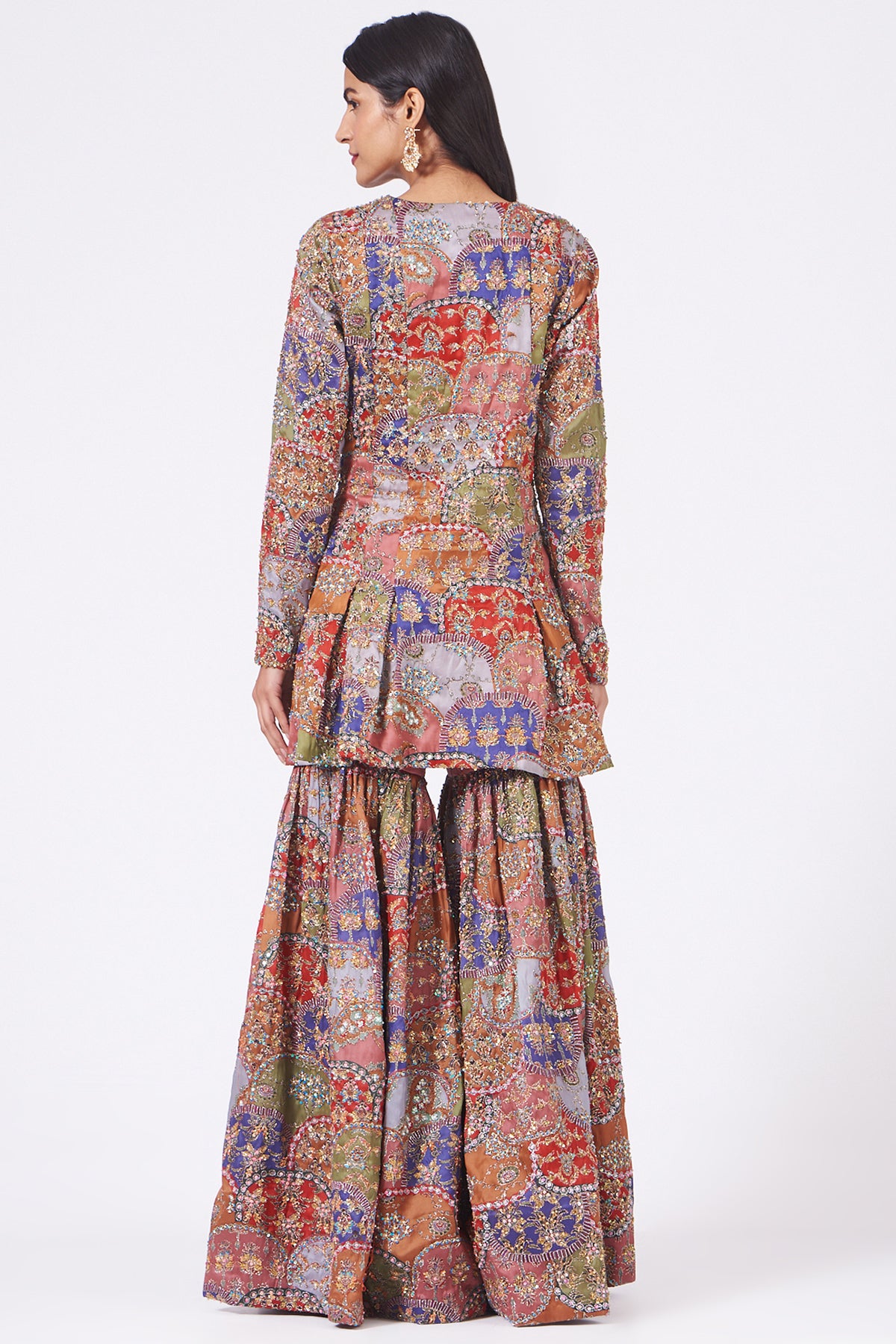 Back view of peach scallop juna sharara set