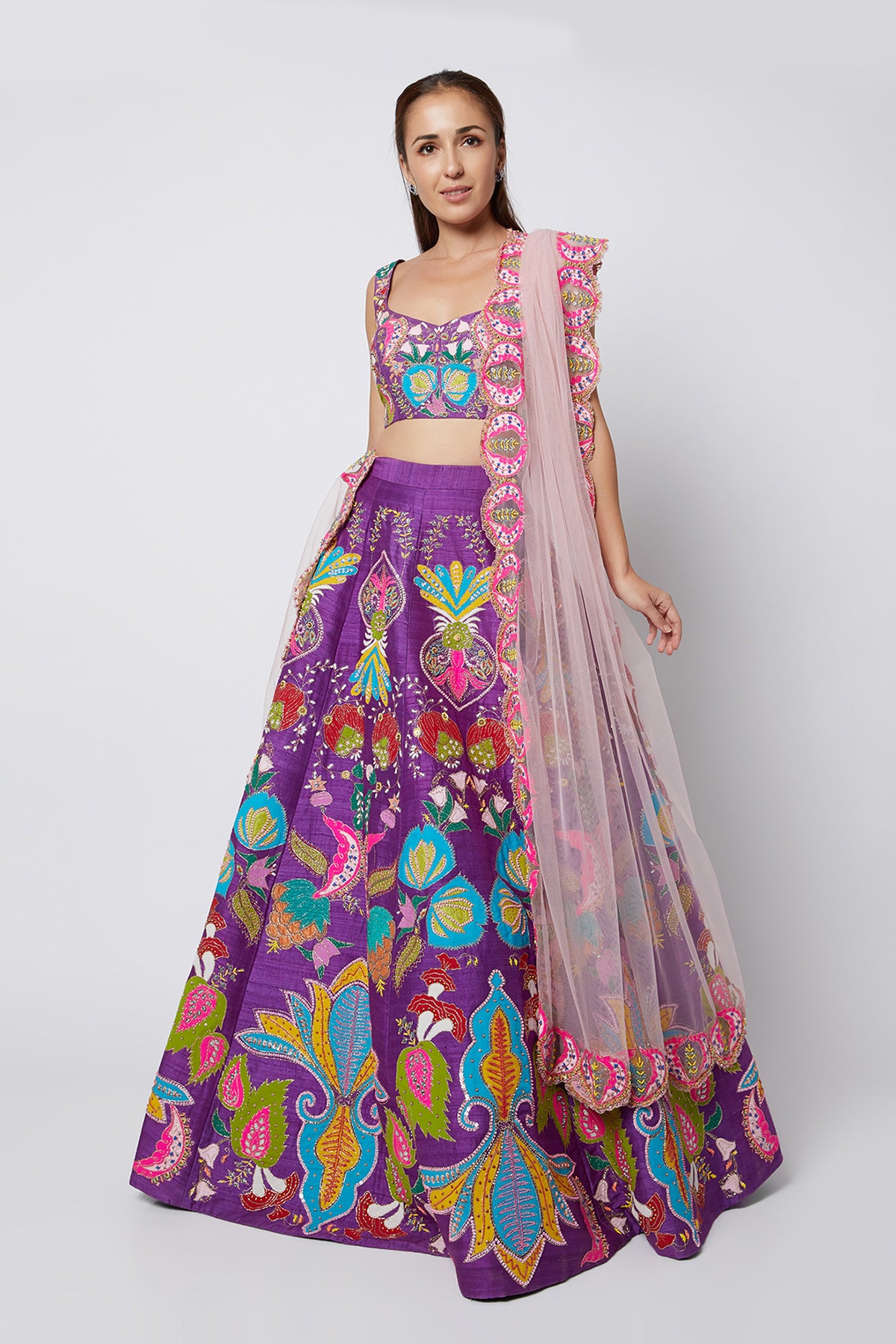 Front view of violet nadenka raw silk appliquéd lehenga with blouse and cutwork tulle dupatta