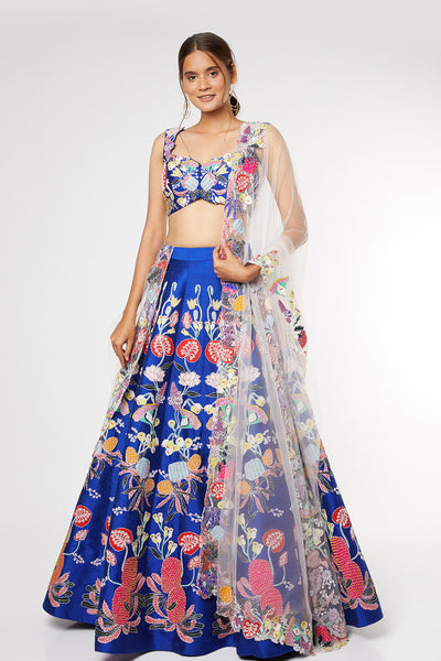 Front view of electric blue pastiche raw silk appliquéd lehenga with blouse and cutwork tulle dupatta