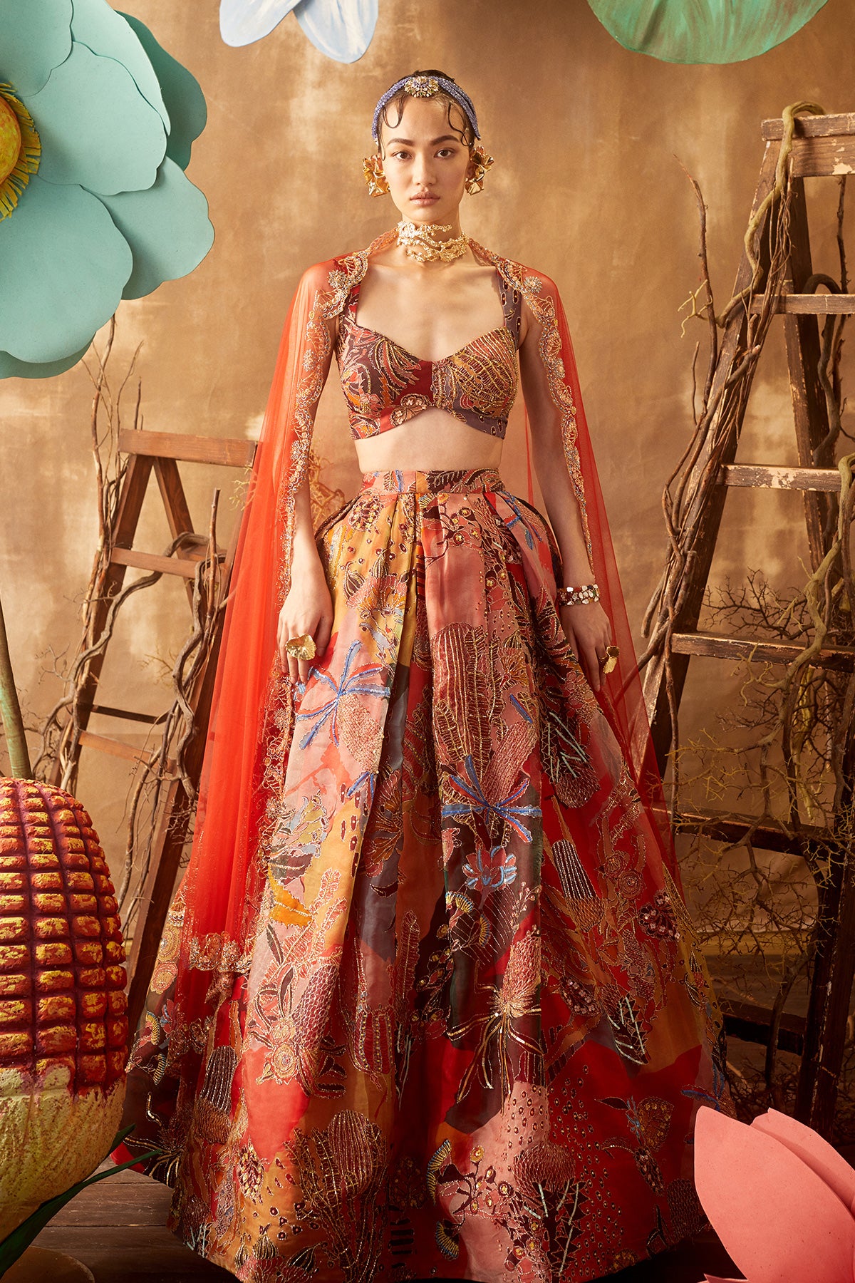 Front view of fiery red pastiche organza printed and embellished top and skirt with dupatta
