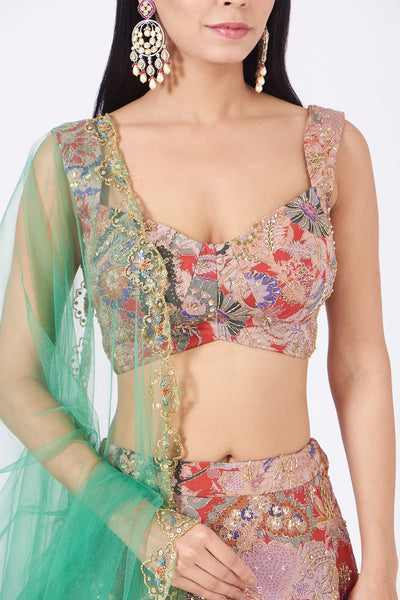 Embellished motifs on red Juna organza blouse