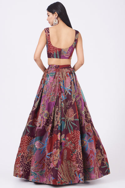 Back view of plum pastiche organza printed and embellished top and skirt with scallop dupatta