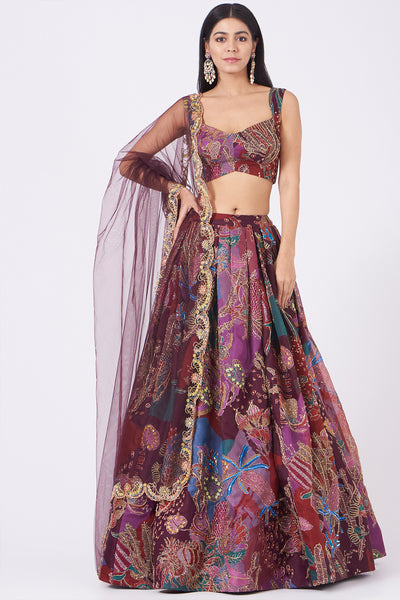 Front view of plum pastiche organza printed and embellished top and skirt with scallop dupatta