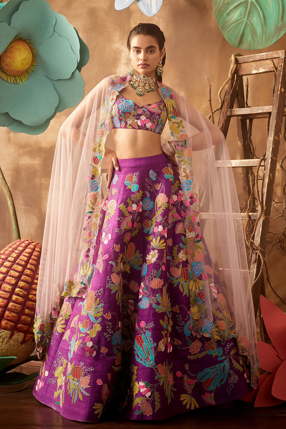 Front view of purple pastiche raw silk appliquéd lehenga with blouse and cutwork dupatta
